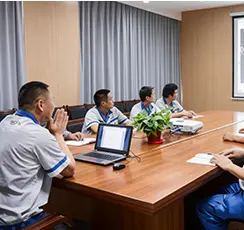 Engineering team holding a project meeting